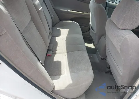 2002 Toyota Camry Le z USA, uszkodzony, nr VIN 4T1BE32K22U007484